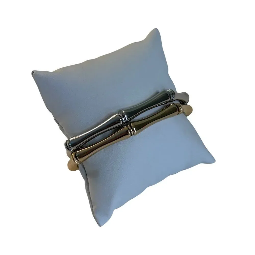 Set of Bamboo Style Stretch Bracelets. One in Gold Tone, One in Silver Tone.